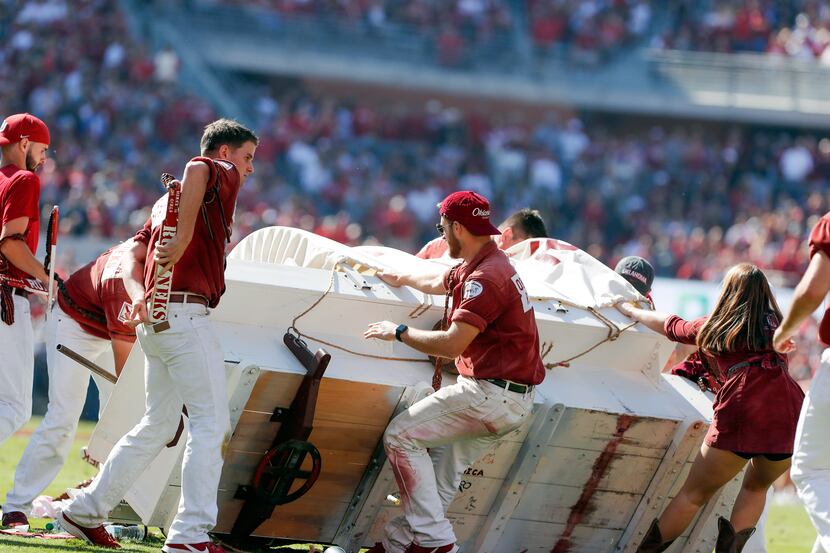 The Oklahoma Sooner Schooner flipped over during a touchdown celebration on the field during...