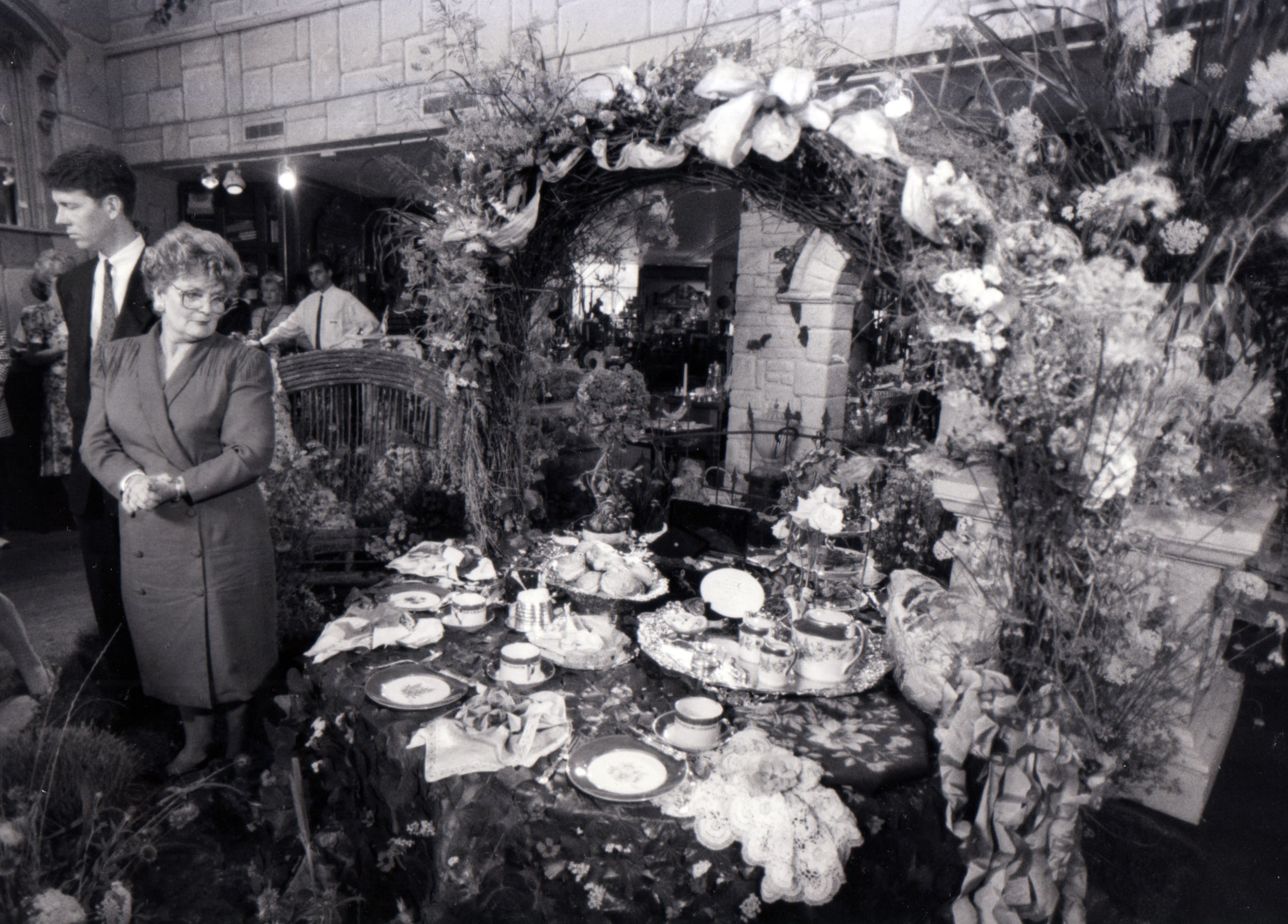 Sharon De Garmo of Dallas' office of international affairs checks over the tea service to be...