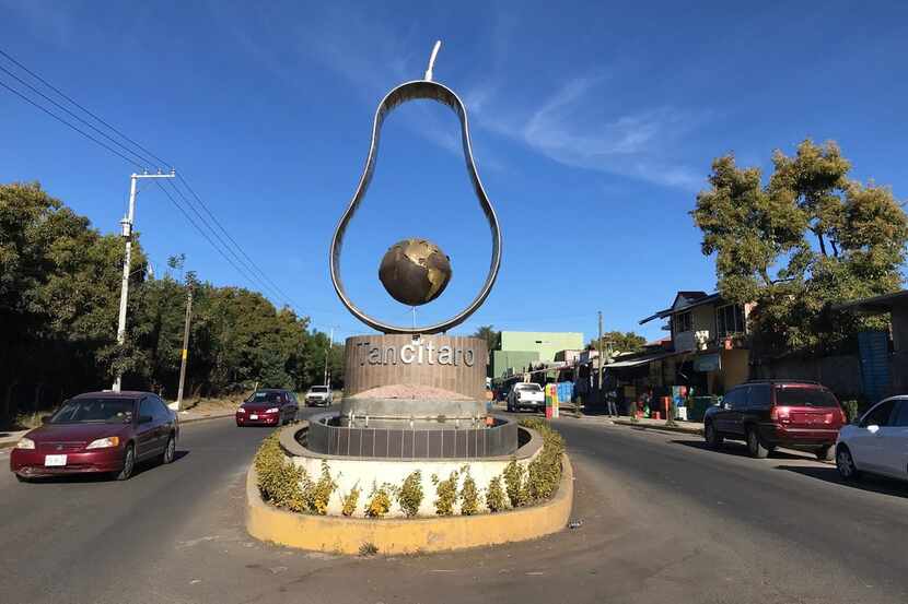 Visitors to the town of Tancitaro are greeted with a sculpture of a giant avocado to...