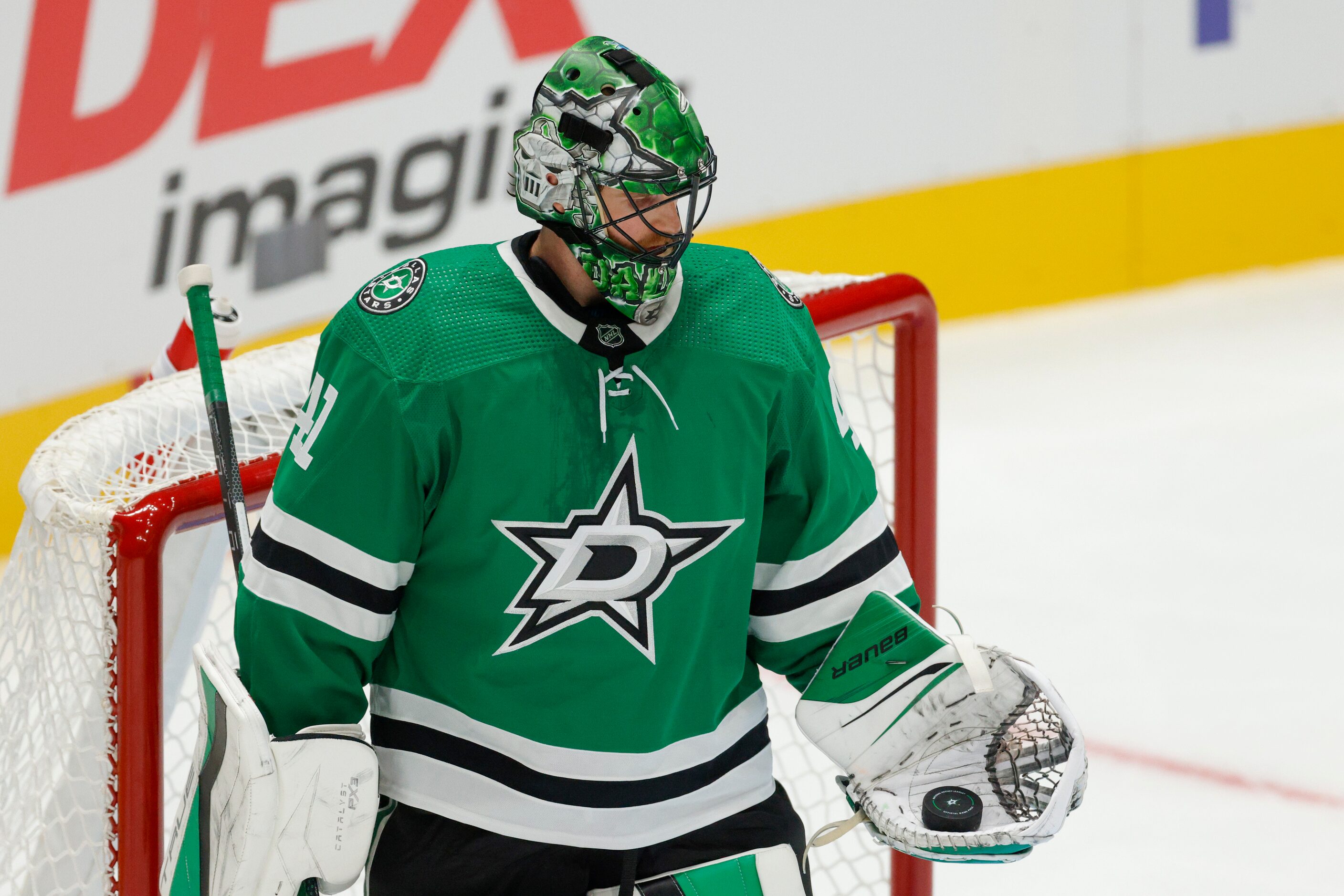 Dallas Stars goaltender Scott Wedgewood (41) holds the puck after making a save during the...