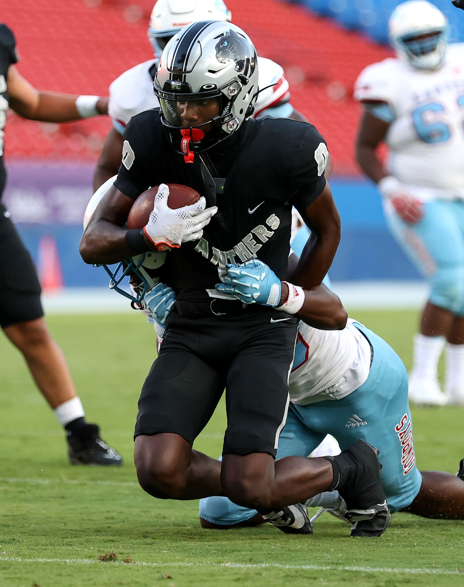 Frisco Panther Creek wide receiver Jalen Lott (0) fights his way to the goalline against...