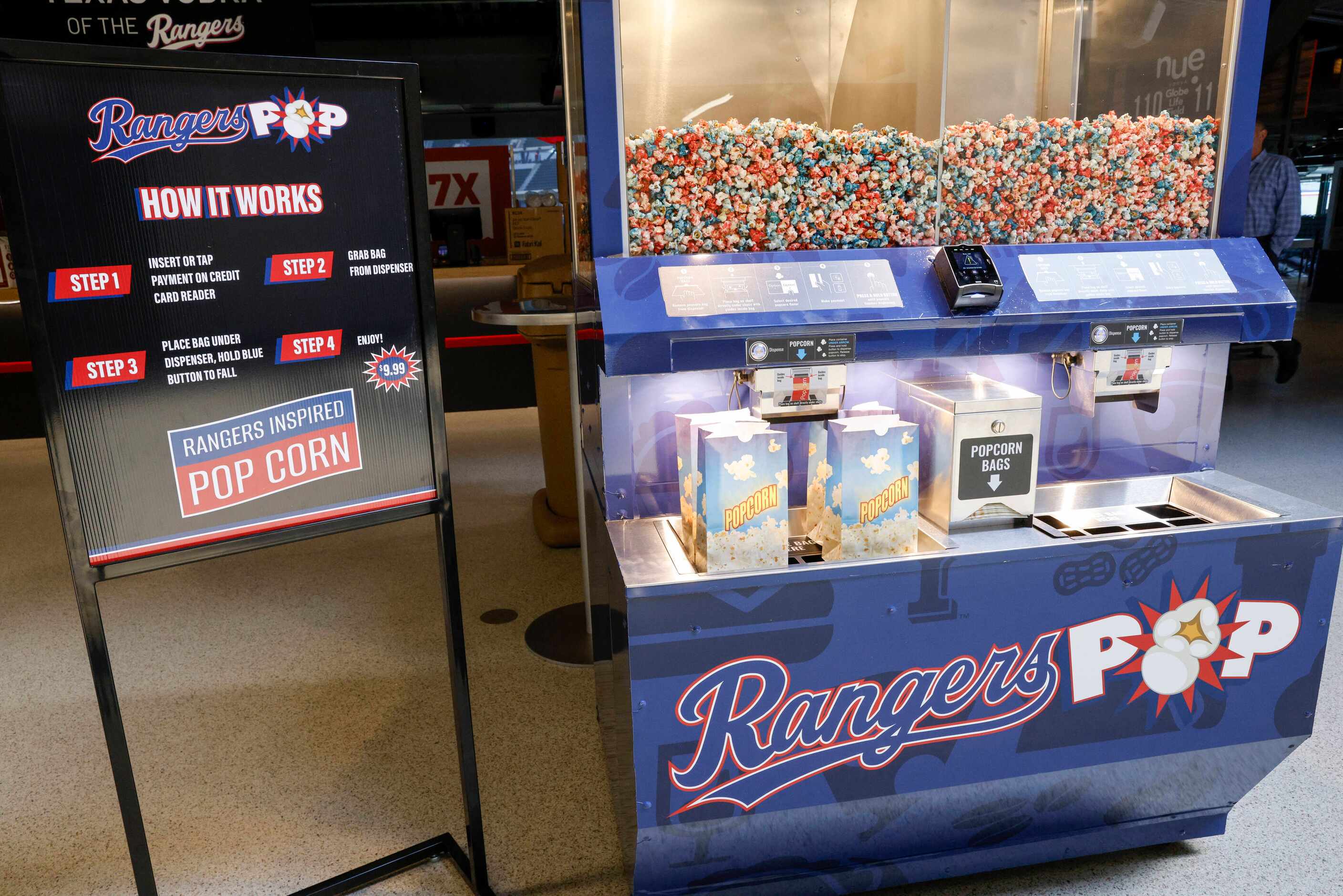 A self-serve popcorn machine is new to Globe Life Field for playoffs games in 2023.