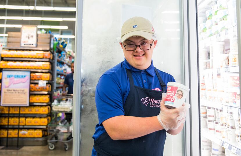 Coleman Jones, vice president of Howdy Homemade Ice Cream, poses at an ice cream fridge at a...