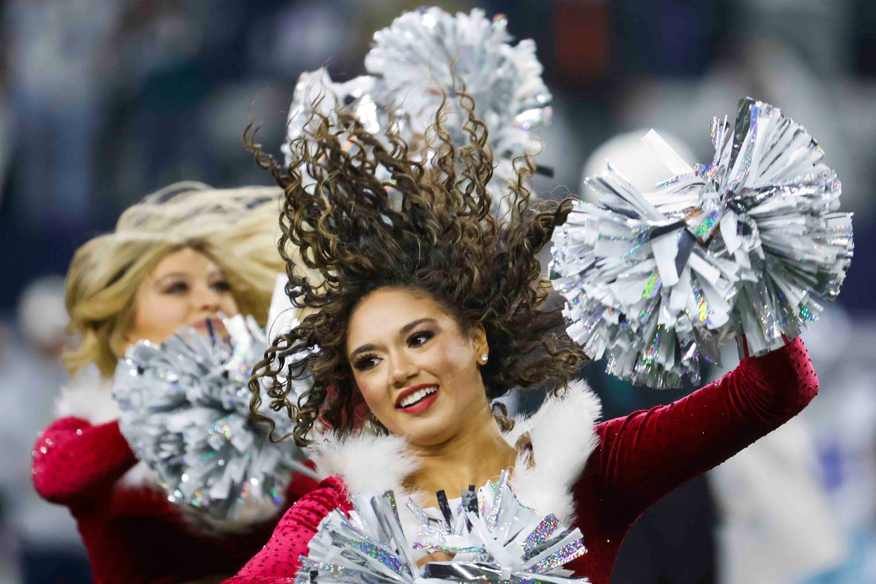 Arlington, United States. 24th Dec, 2022. Dallas Cowboys Dak Prescott gets  stopped by Philadelphia Eagles Brandon Graham, left, and Ndamukong Suh  during their NFL game at AT&T Stadium in Arlington, Texas on