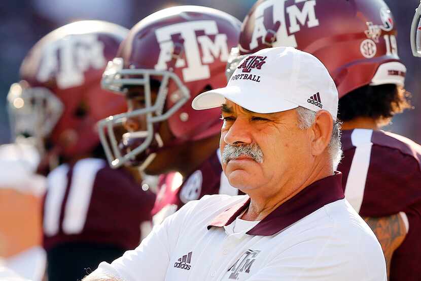Texas A&M Aggies defensive coordinator John Chavis watches his players warm up before facing...
