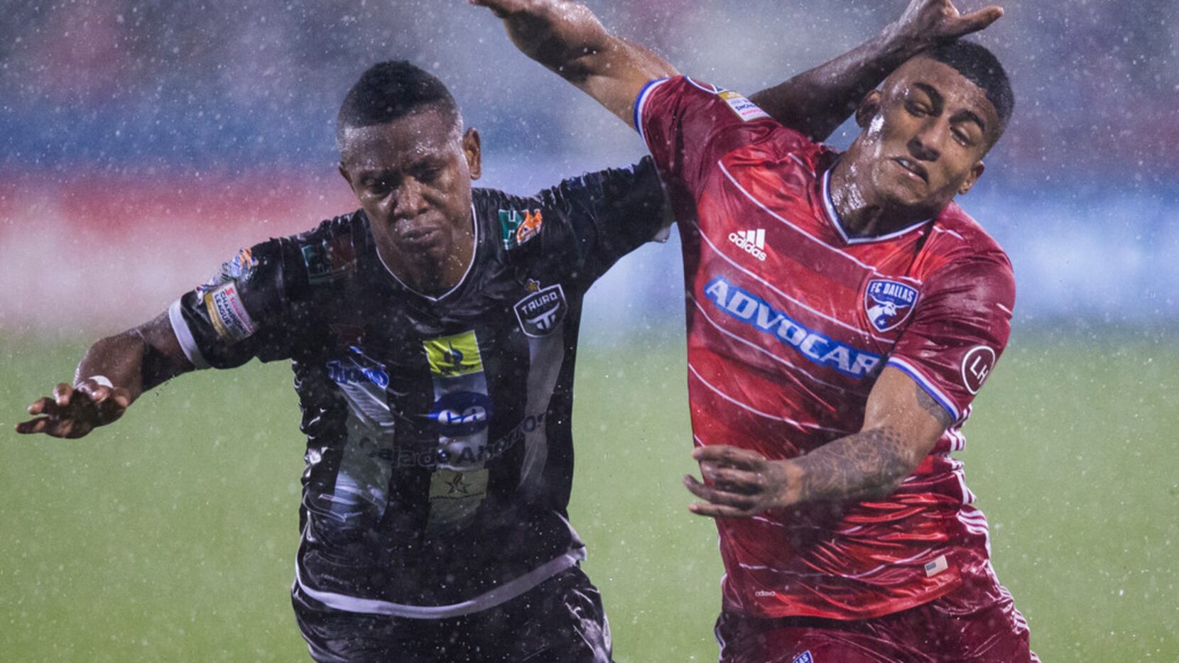 FC Dallas midfielder Santiago Mosquera (11) gets a hand to the face from Tauro F.C.'s...