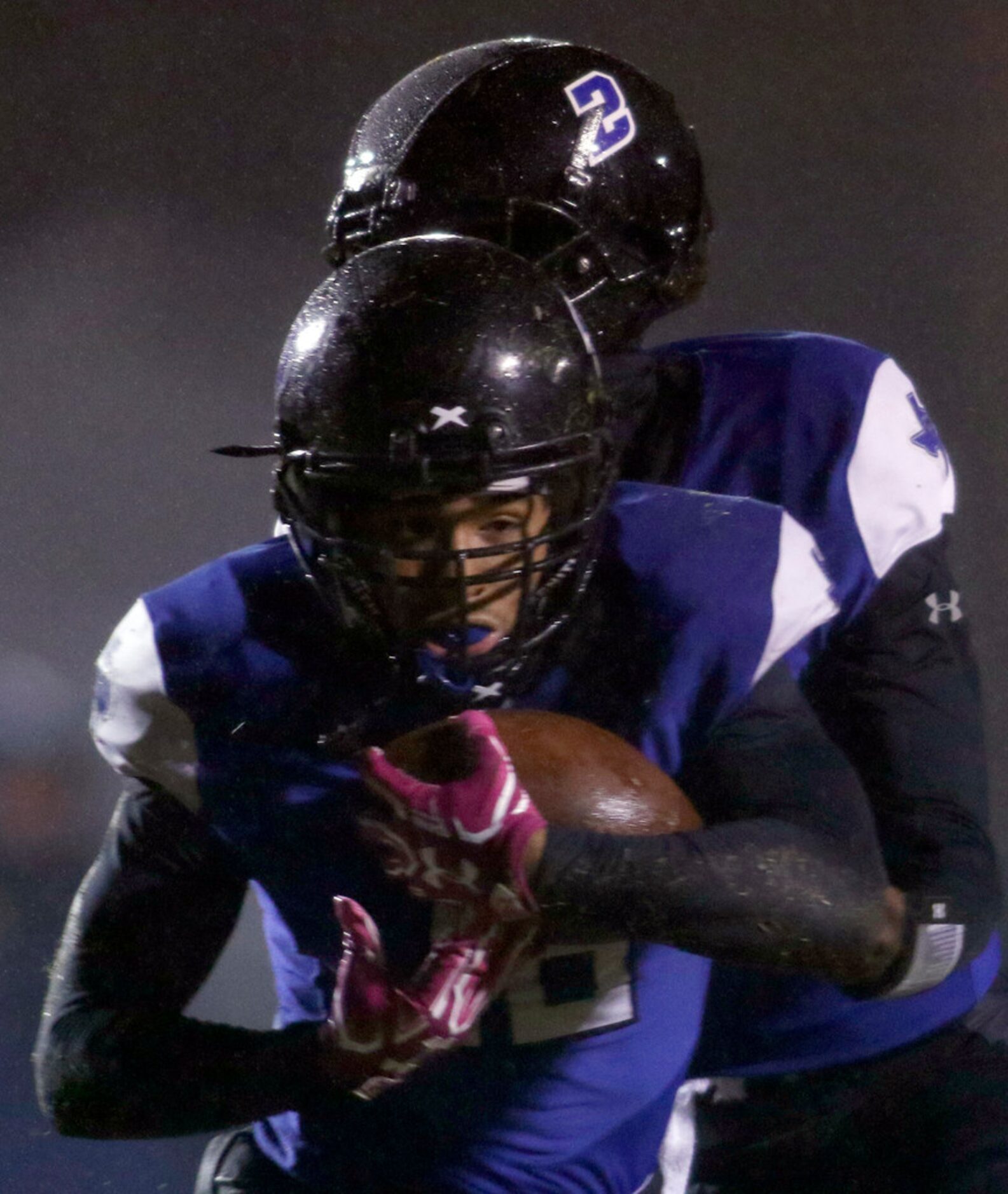 Trinity Christian-Cedar Hill running back Emari Matthews (18) takes the handoff from...