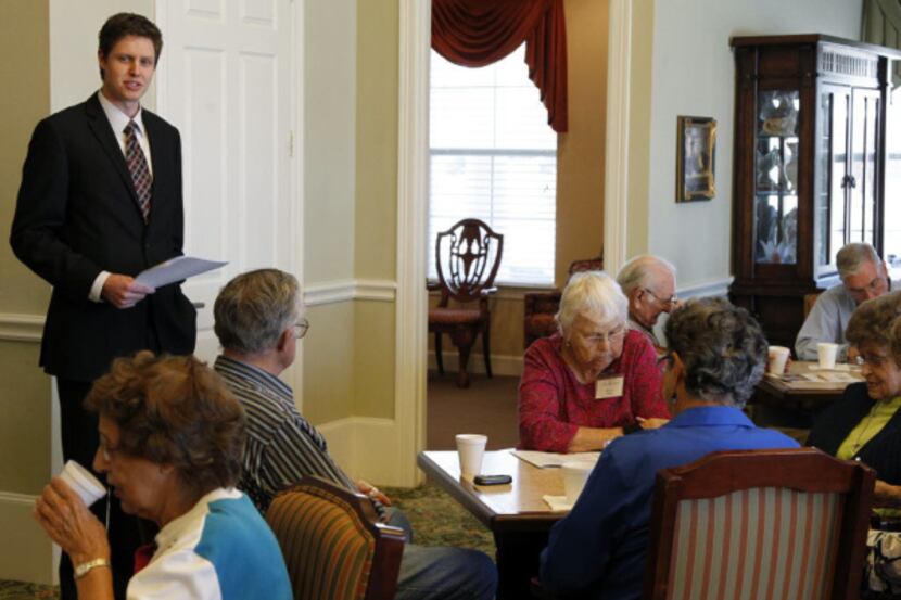 Financial adviser Michael DeGroat talked recently with residents at Twin Rivers Senior...