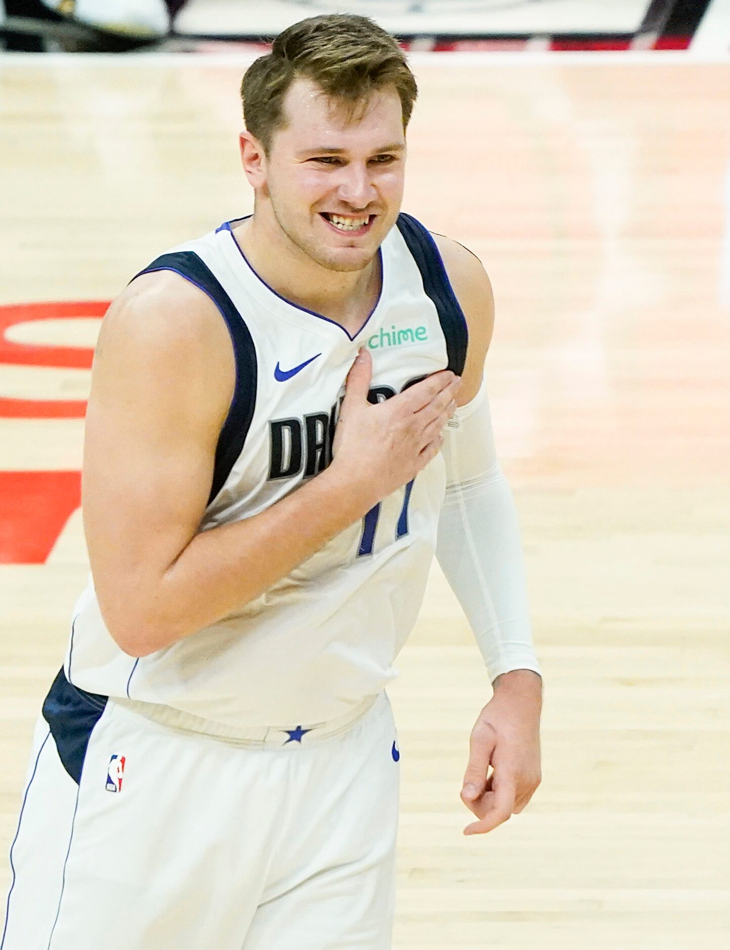 Dallas Mavericks guard Luka Doncic celebrates after hitting a 3-pointer during the third...