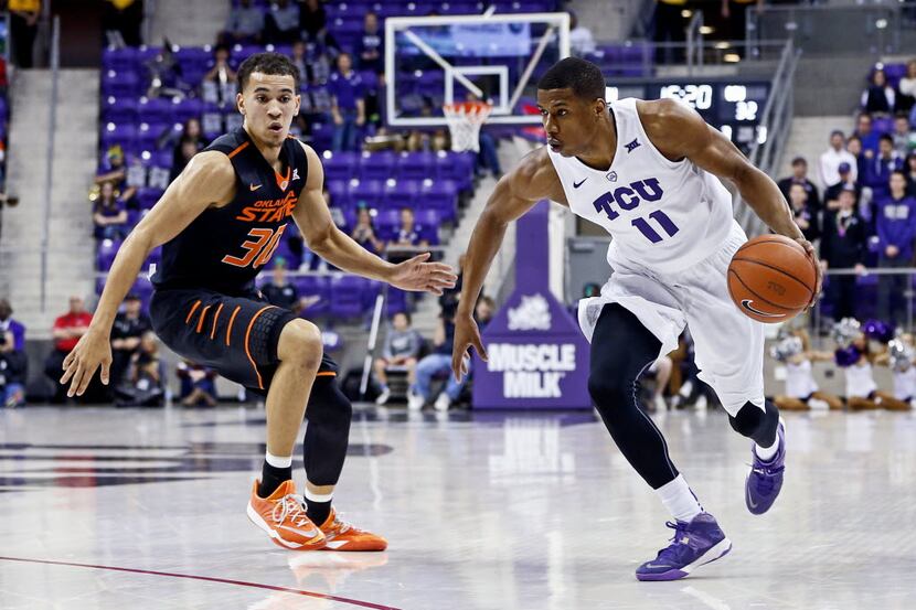 Feb 8, 2016; Fort Worth, TX, USA; TCU Horned Frogs guard Brandon Parrish (11) drives to the...