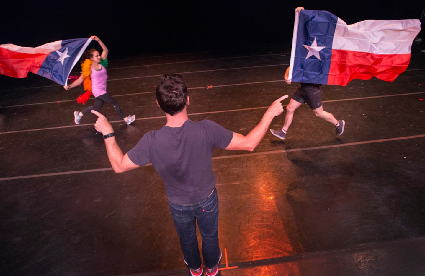 Choreographer Larry Keigwin works with performers during a rehearsal as they prepare for...