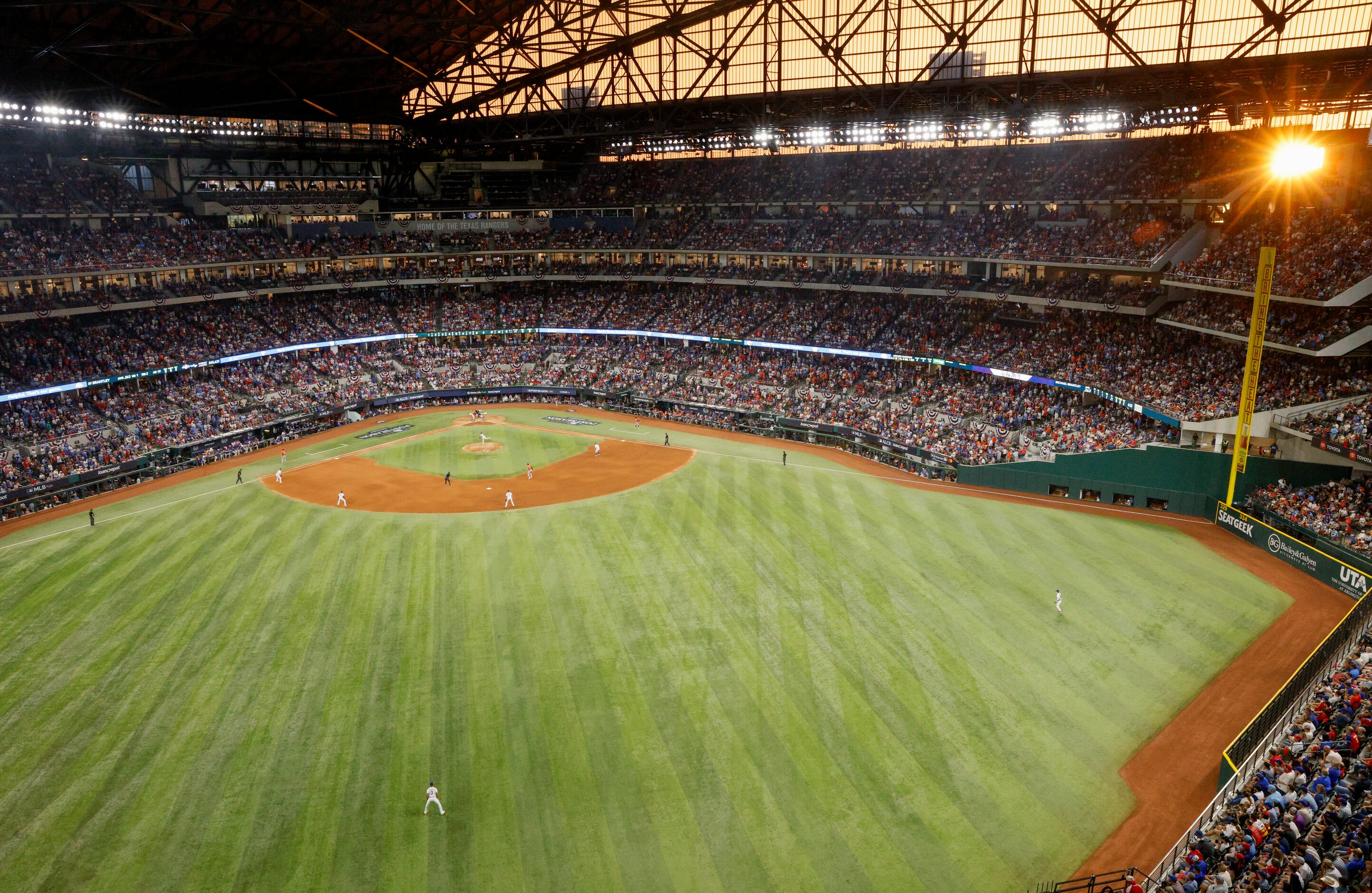 The sun shines through during the eighth inning of Game 5 of the American League...