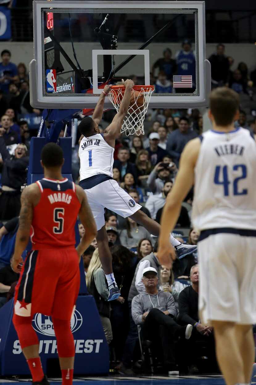 Dennis Smith Jr. #1 of the Dallas Mavericks dunks the ball against the Washington Wizards in...