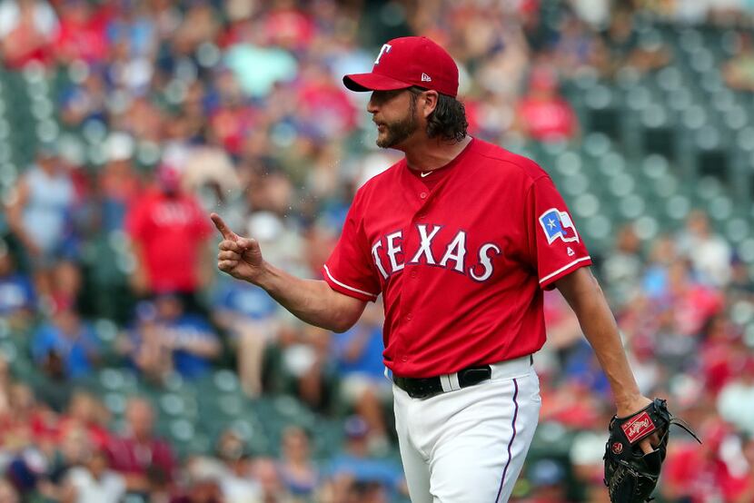 ARLINGTON, TX - SEPTEMBER 03:  Jason Grilli #37 of the Texas Rangers reacts after striking...