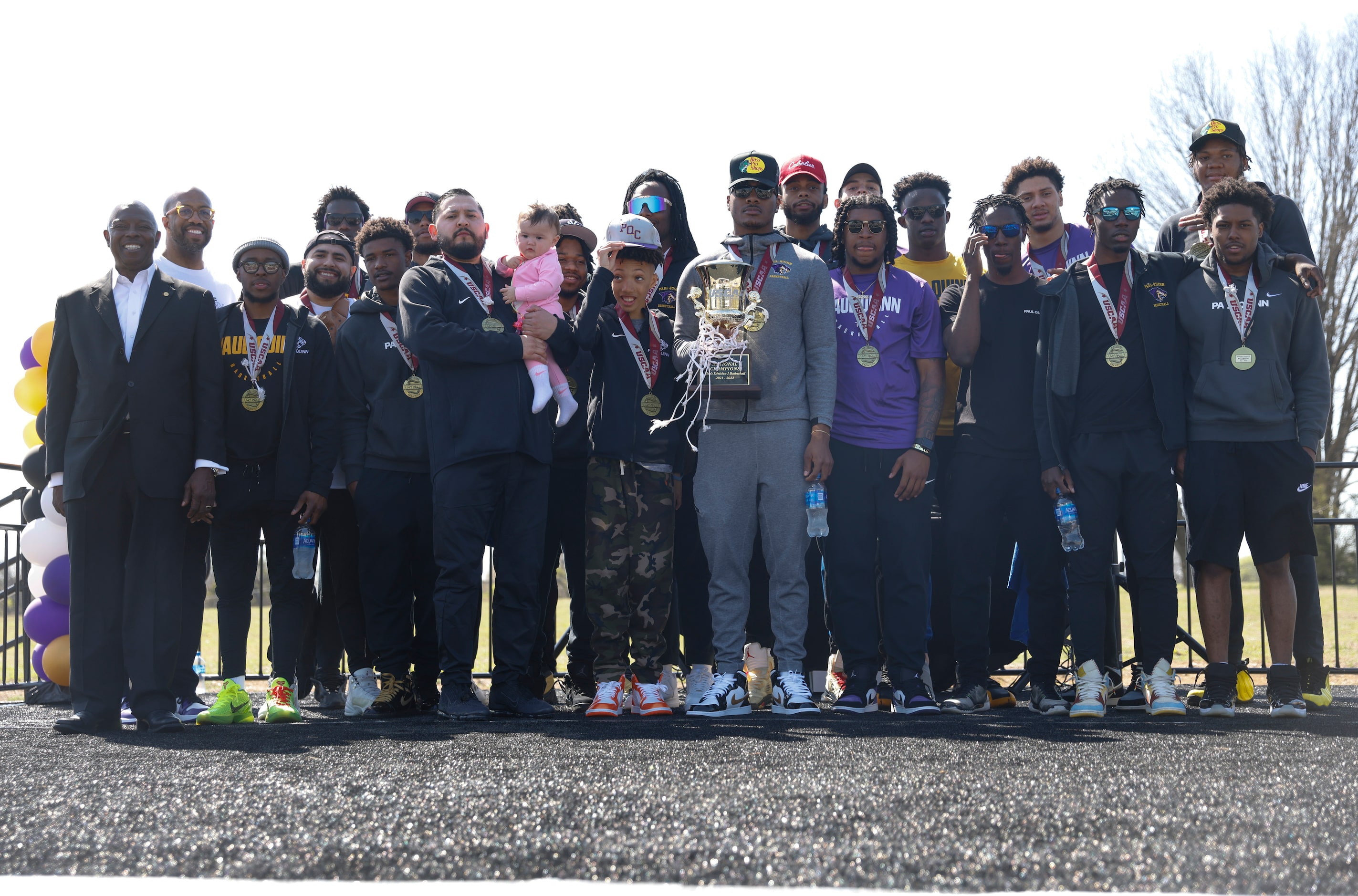 Paul Quinn College Men's basketball team, poses for a picture at the Parade of Champions,...