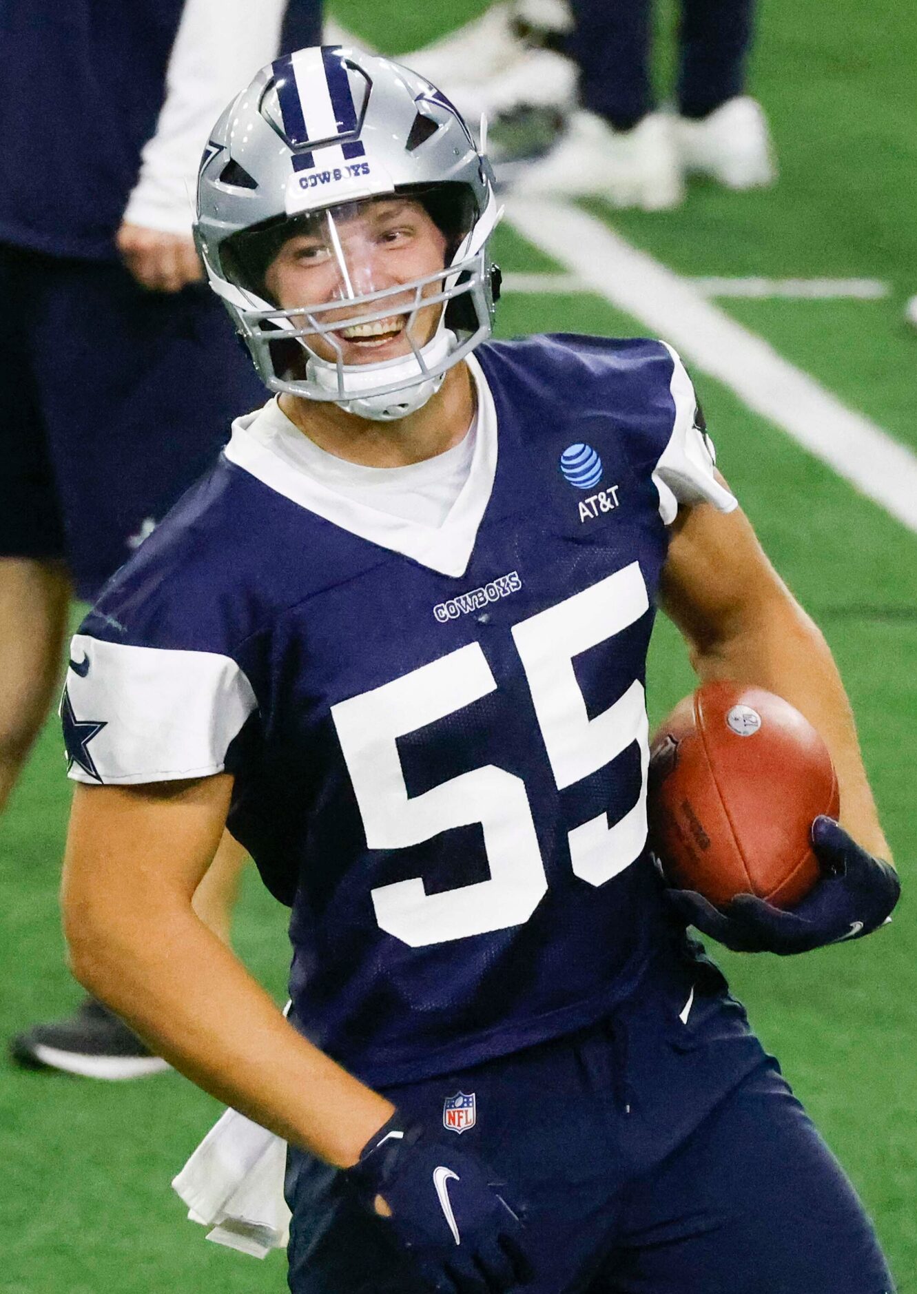 Dallas Cowboys linebacker Leighton Vander Esch reacts upon receiving a pass during OTA...