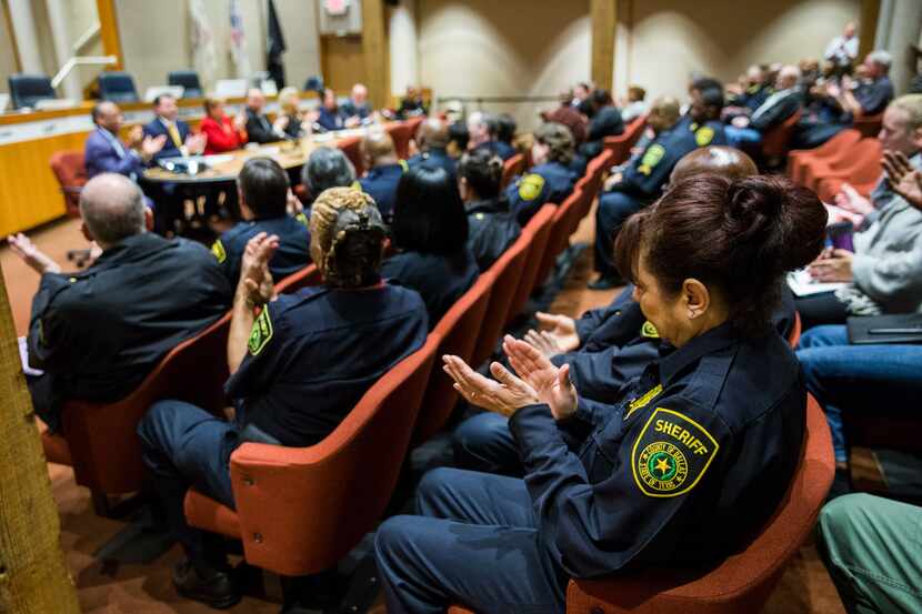 Dallas County sheriff's deputies applauded Friday as the Texas Commission on Jail Standards...