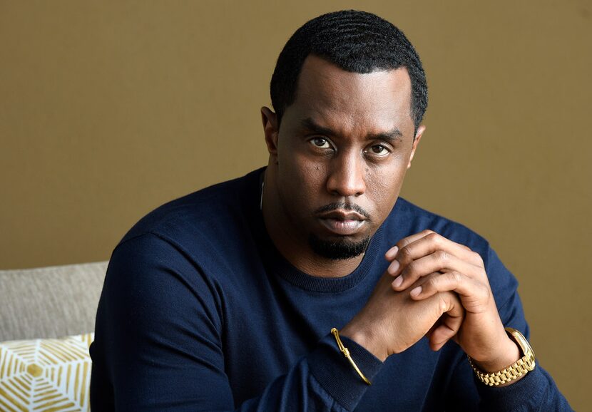 Sean Combs said he may want to buy the Carolina Panthers and sign Colin Kaepernick. (File...