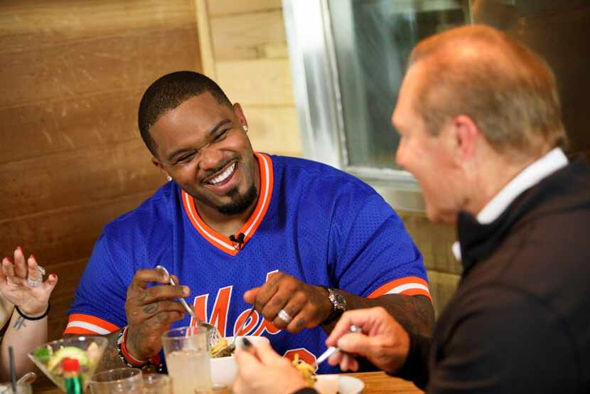 Prince Fielder laughs while eating a bowl of Uni Pasta during filming of his show "Fielder's...