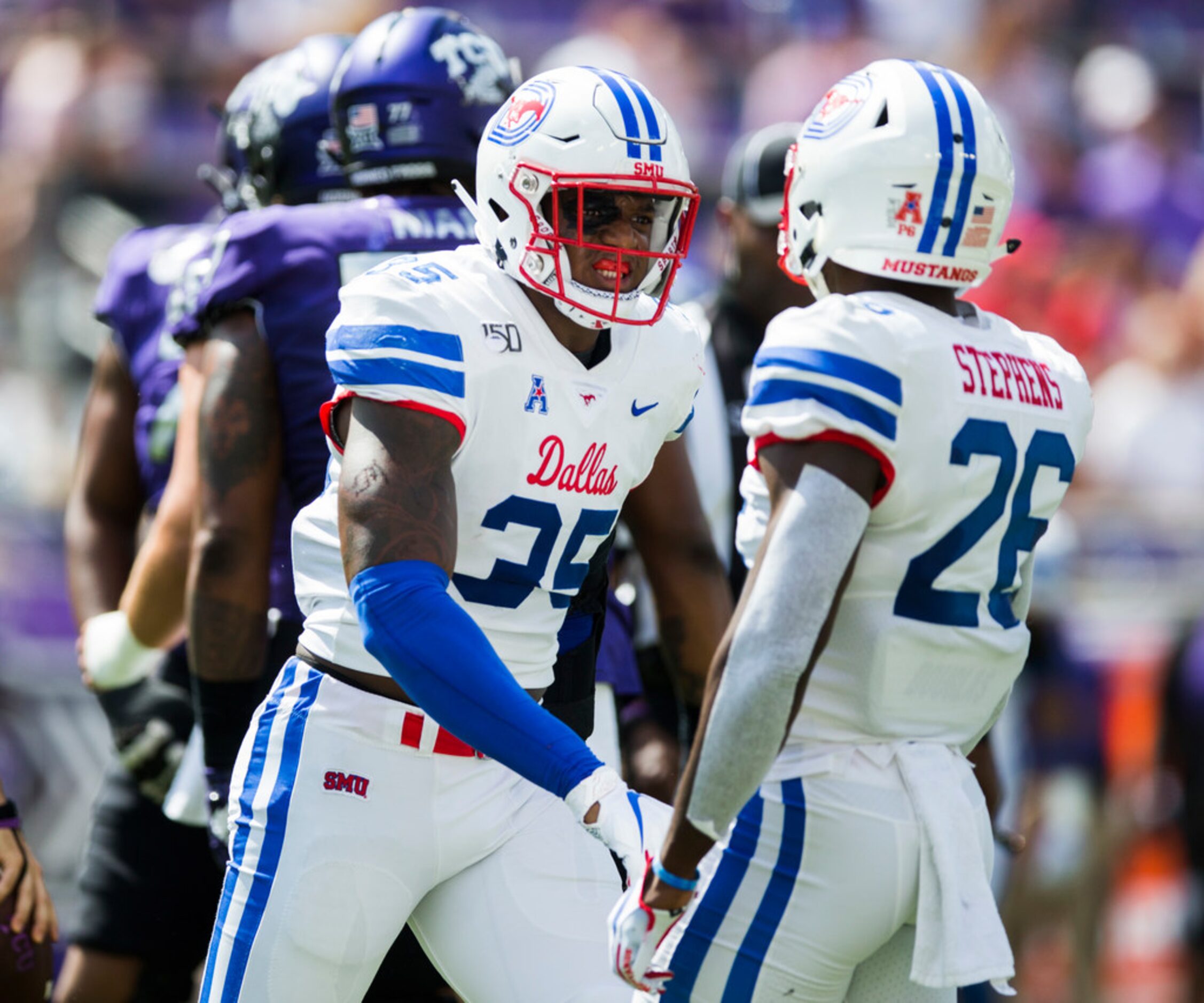 Southern Methodist Mustangs defensive end Delontae Scott (35) celebrates a hit with...