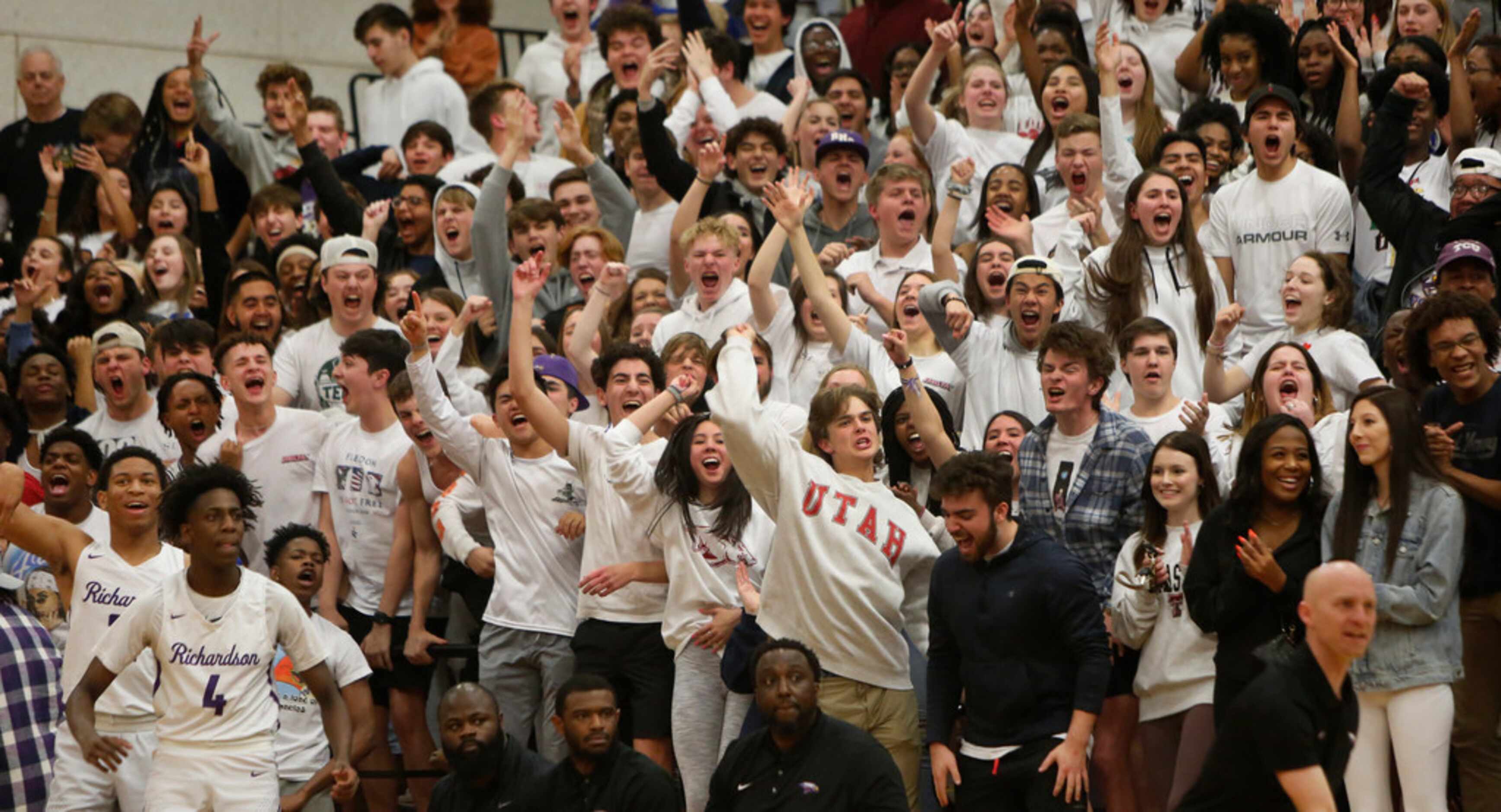 A capacity crowd, which included a loud and rowdy student section, erupt in euphoria after...