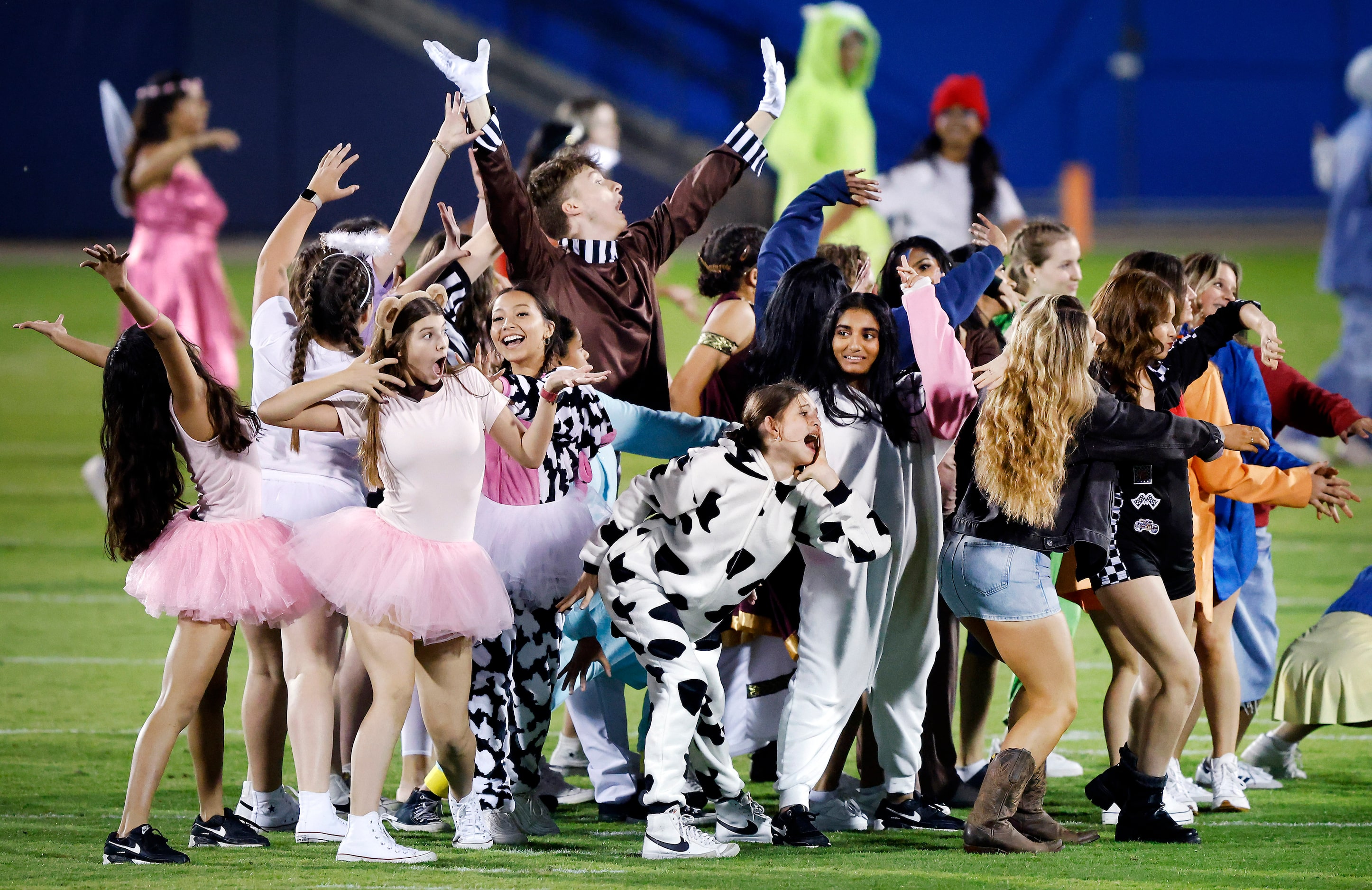 Dressed for Halloween, the Frisco Independence Royals Drill Team performs Michael Jackson’s...