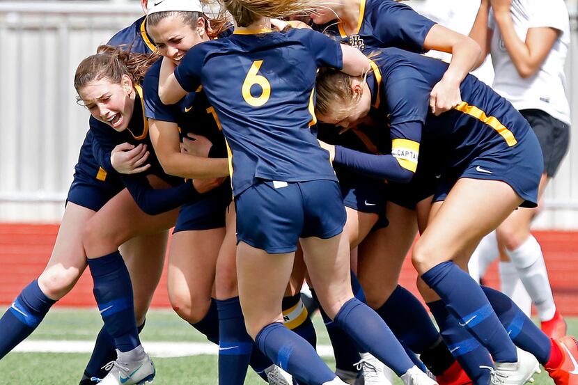 The Highland Park girls soccer team celebrates a 2-1 victory over Frisco Independence in the...
