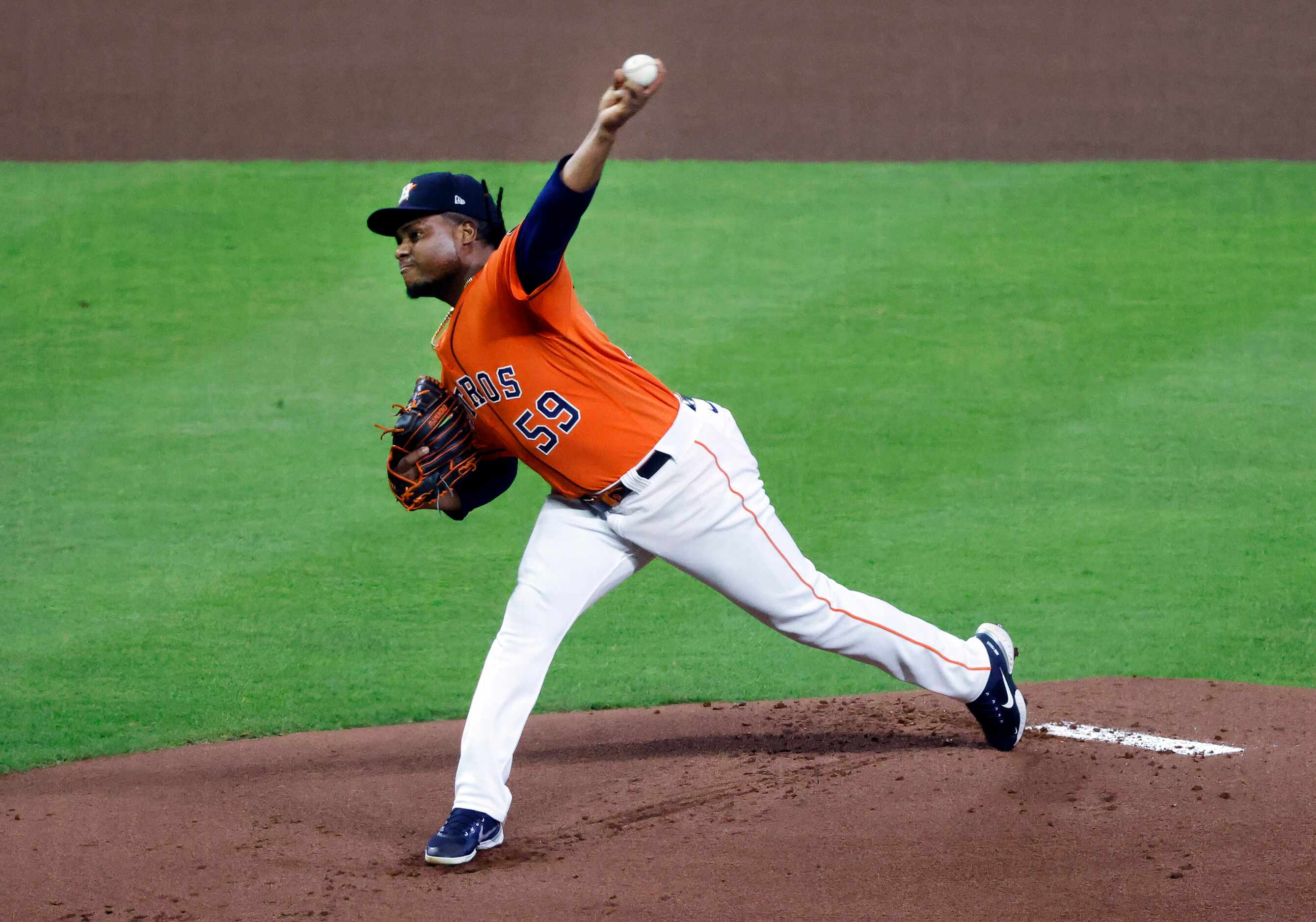 Houston Astros starting pitcher Framber Valdez (59) throws in the first inning during Game 6...