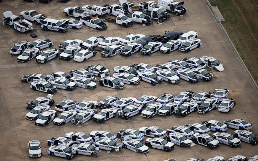 Old Dallas police cars are being stored at the former Hensley Field. (Vernon Bryant/Staff...