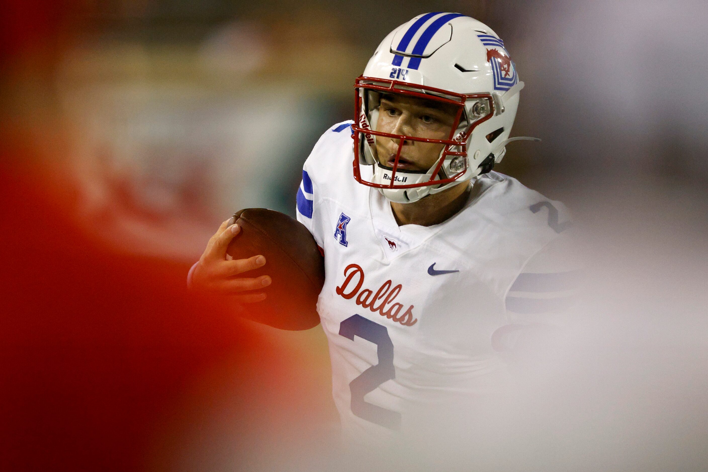 SMU quarterback Preston Stone (2) runs with the ball during the fourth quarter of a game...