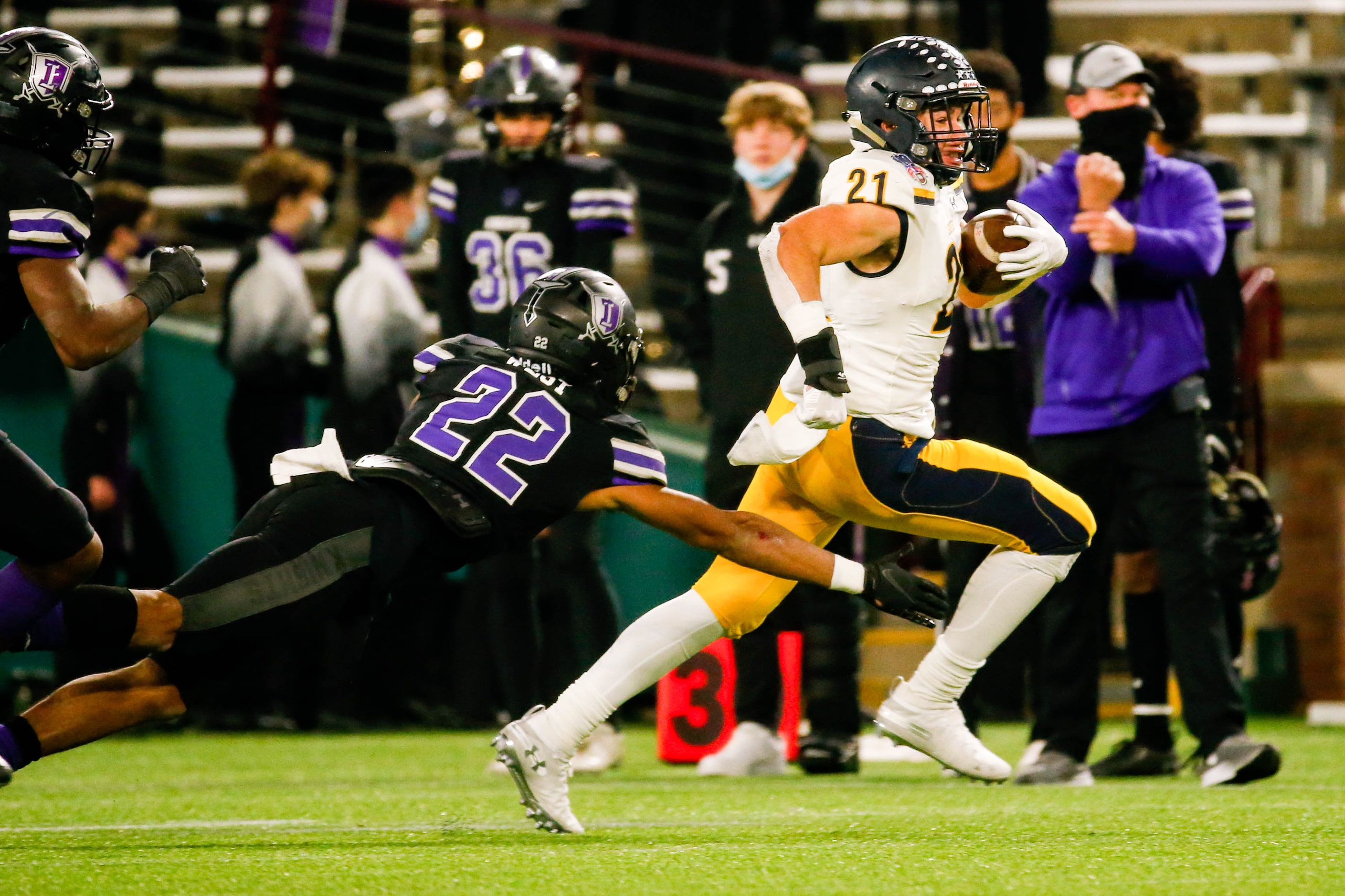 Highland Park's Anthony Ghobriel (21) dodges Frisco Independence's Brayden West (22) during...