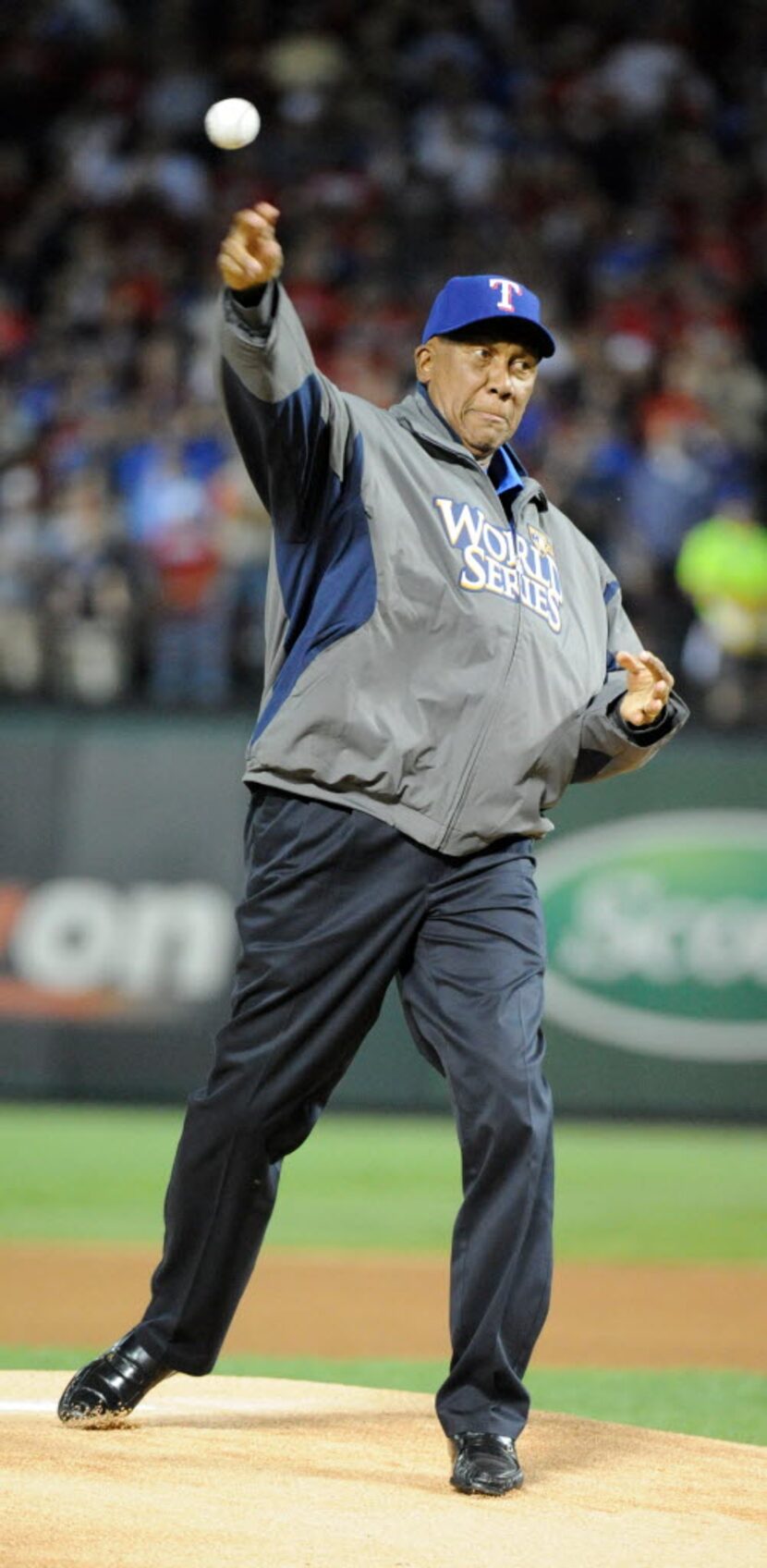 Former Texas Ranger pitcher Ferguson Jenkins throws the first pitch before the San Francisco...