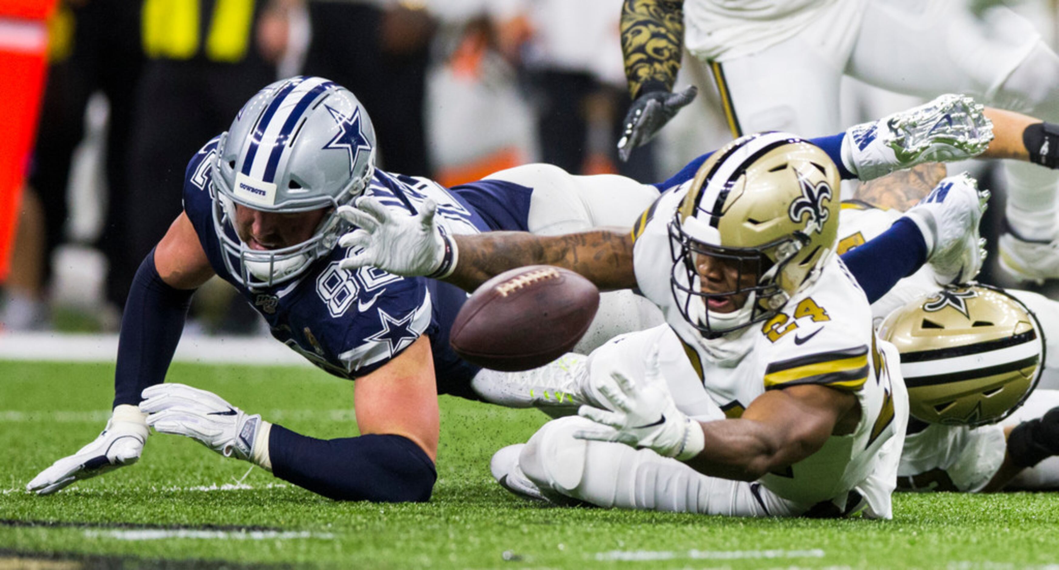 Dallas Cowboys tight end Jason Witten (82) fumbles the ball and its picked up by New Orleans...
