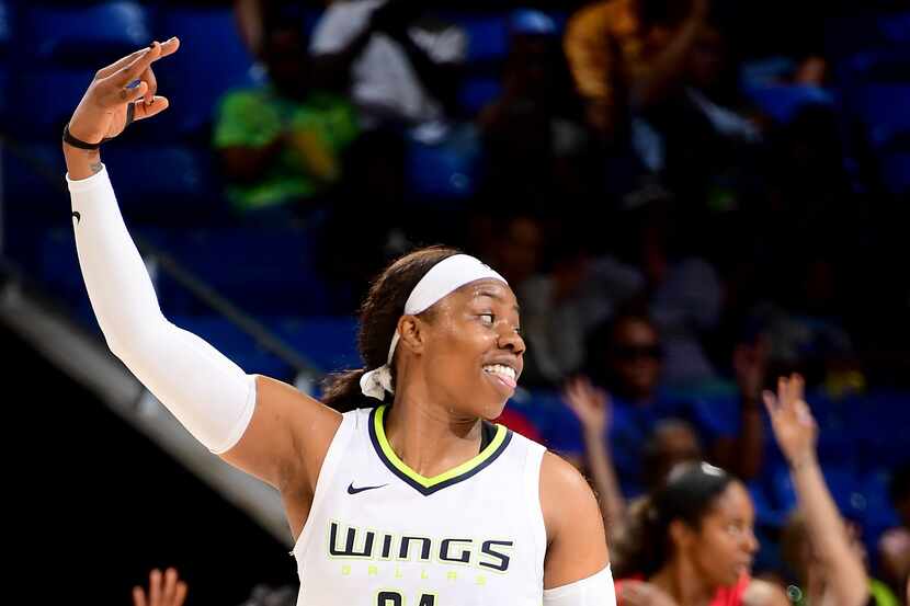 Arike Ogunbowale #24 of the Dallas Wings looks on during the game against the Atlanta Dream...
