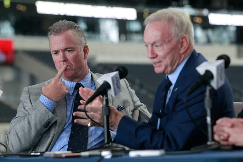 Dallas Cowboys Director of Player Personnel Stephen Jones and Owner Jerry Jones speak during...