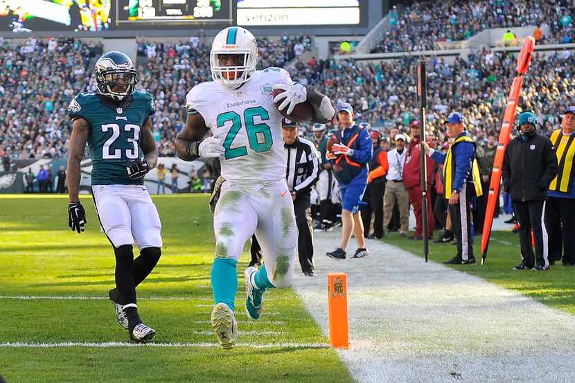 PHILADELPHIA, PA - NOVEMBER 15:  Lamar Miller #26 of the Miami Dolphins scores a second...
