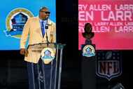 Dallas Cowboys tackle/guard Larry Allen flashes a large smile as he is inducted into the Pro...