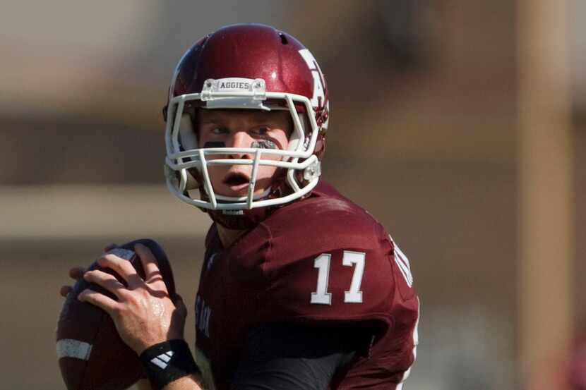Former Texas AM quarterback Ryan Tannehill throws a pass during first half of the NCAA...