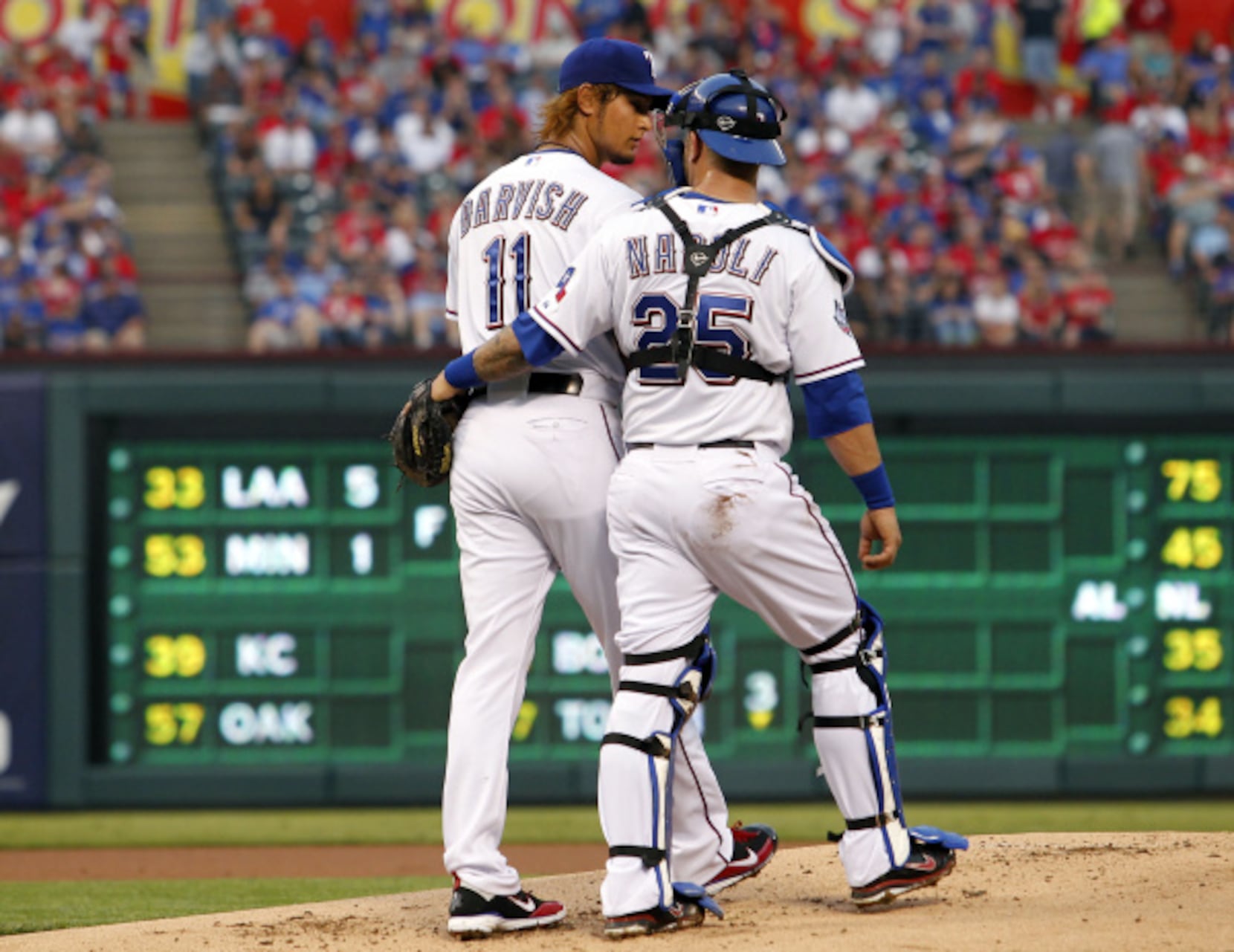 Rangers' Yu Darvish impresses in his first major-league start since 2014 