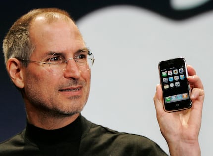 Apple CEO Steve Jobs showed off the company's first iPhone during a keynote address at...