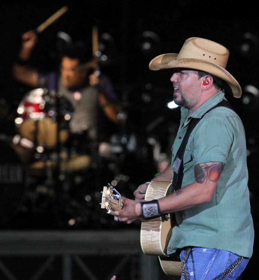 Country music recording artist Jason Aldean performs with his band at AT&T Stadium.
