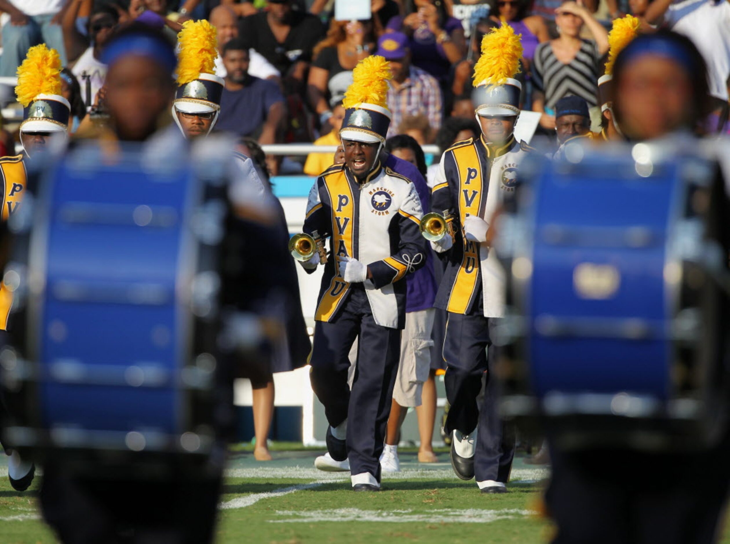 Prairie View A&M marching band performs during halftime during a college football game...