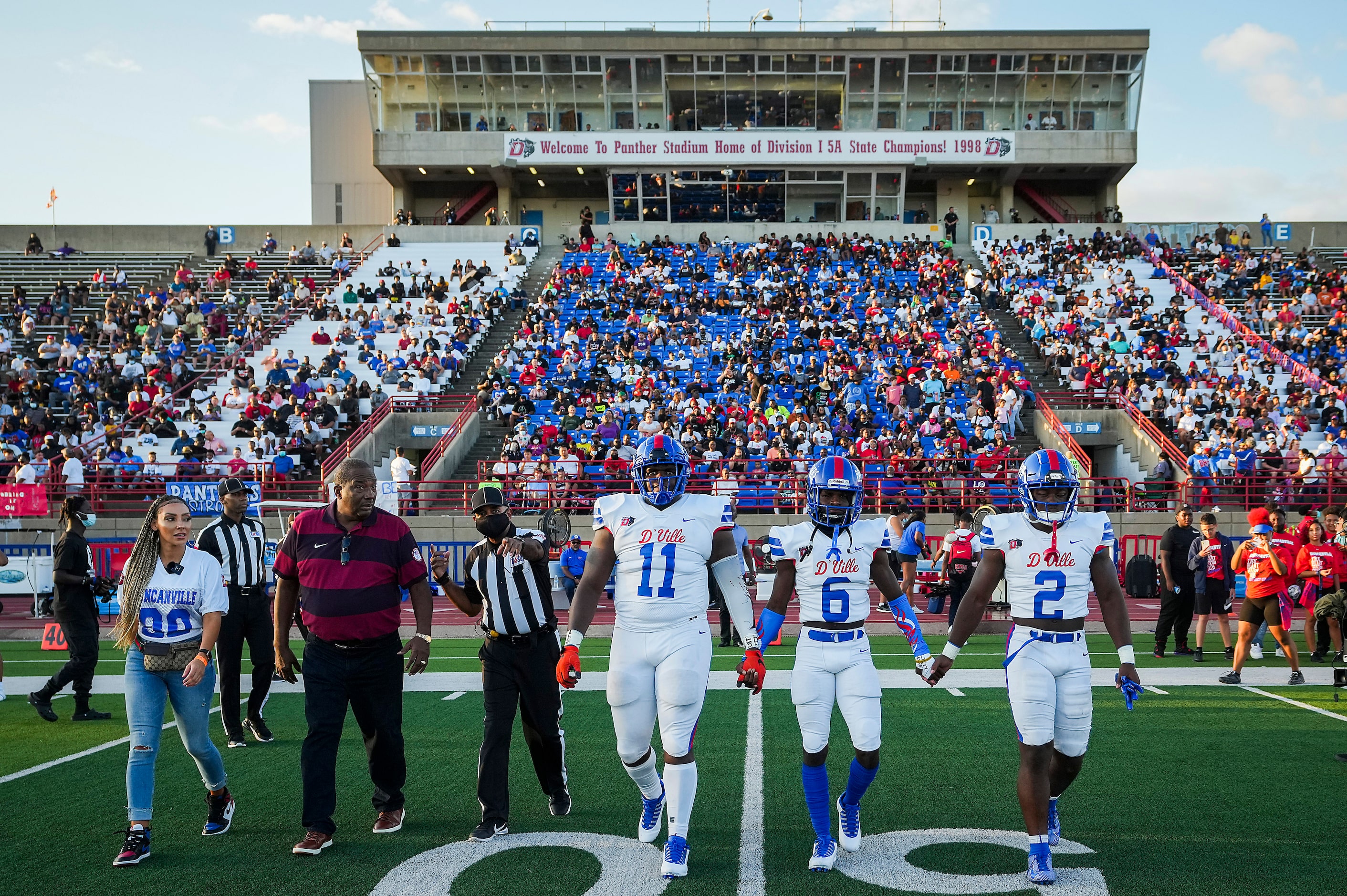 Duncanville’s Quincy Wright (11), Da’Myrion Colemann (6) and linebacker Jordan Crook (2)...