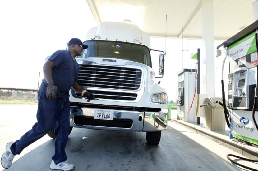 Gary Smith of PAM Transport fills up at the Clean Energy natural gas station at Irving...