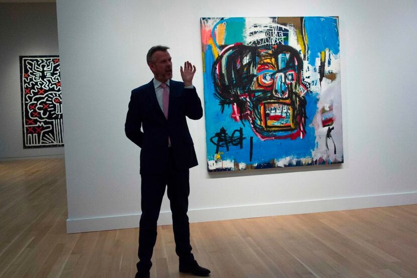 A Sotheby's official speaks about an untitled painting by Jean-Michel Basquiat during a...