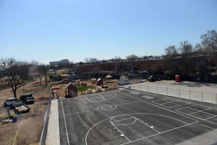 
The new court and playground await children at Vogel Alcove's new facility in Dallas. The...