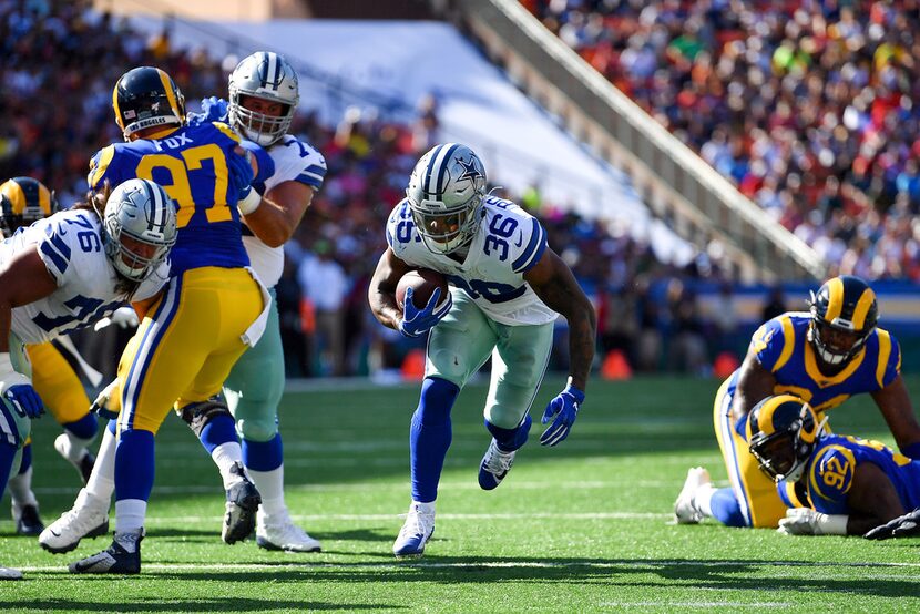 HONOLULU, HAWAII - AUGUST 17: Tony Pollard #36 of the Dallas Cowboys runs his way to the...