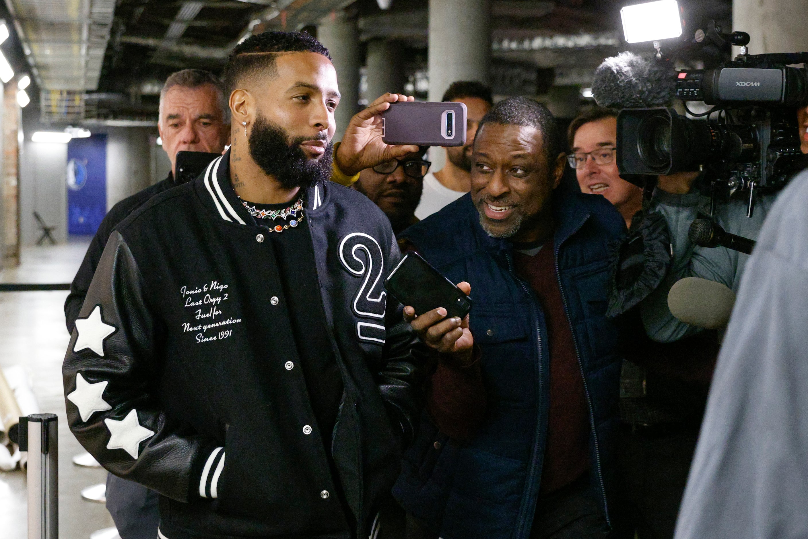 NFL free agent Odell Beckham Jr. (left) talks with The Dallas Morning News’ Dallas Cowboys...