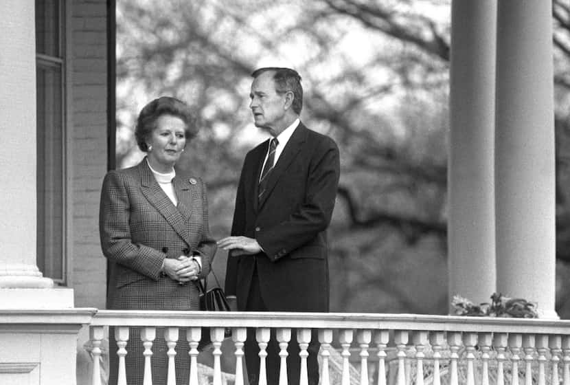 1988: President-elect George H.W. Bush speaks with British Prime Minister Margaret Thatcher...