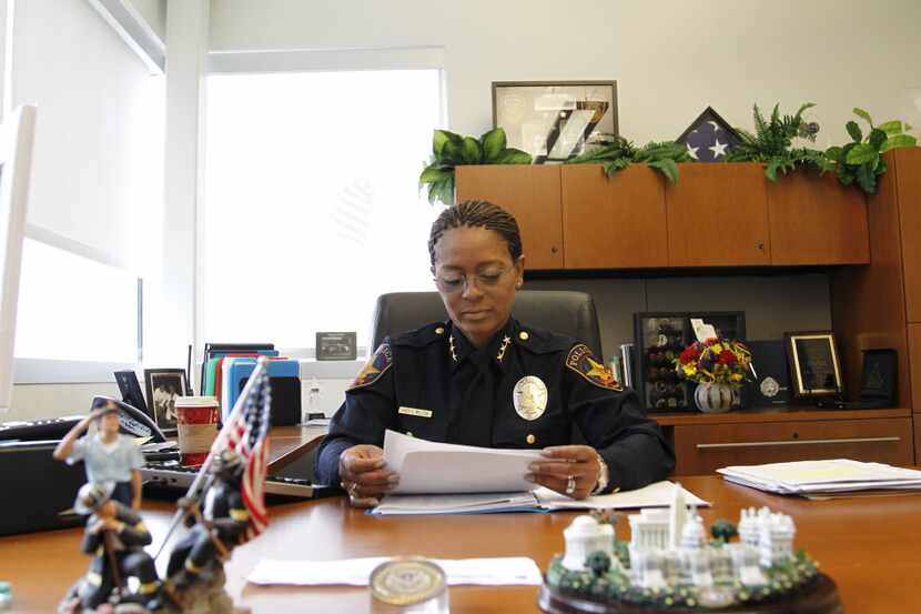  Chief Cheryl D. Wilson goes over documents while in her office at the Lancaster Police...